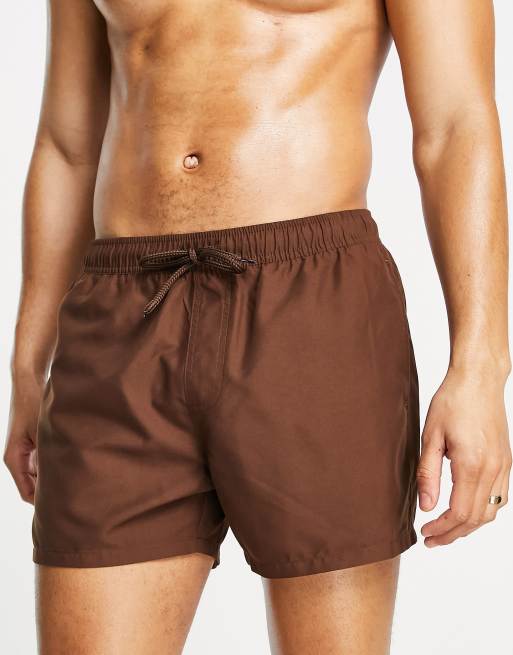 ASOS DESIGN swim shorts in short length with pin tuck in brown