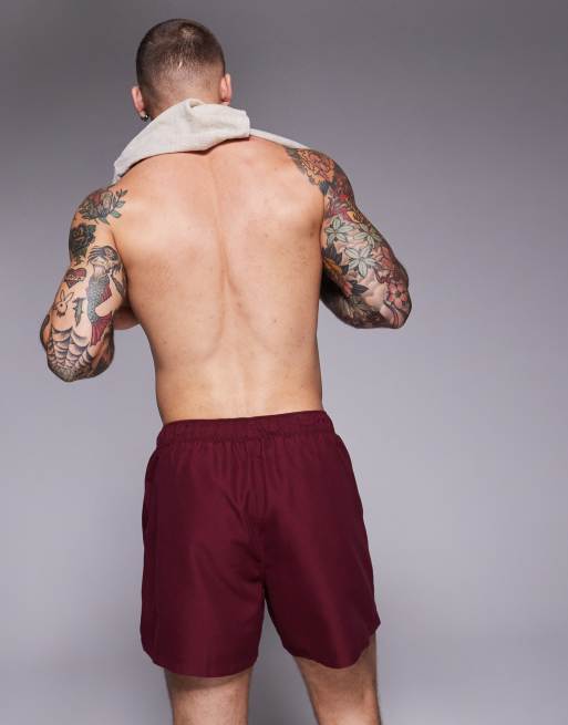 ASOS DESIGN swim shorts in short length with placement print in burgundy, 4 of 4