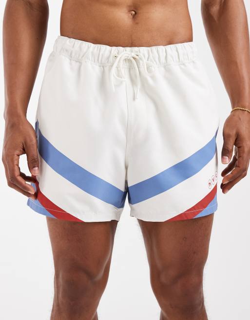 ASOS DESIGN swim shorts in short length with placement print in cream, 4 of 5