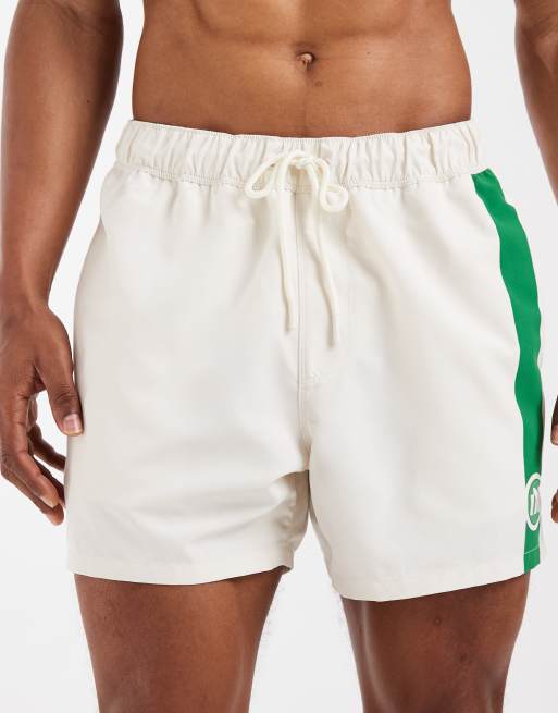 ASOS DESIGN swim shorts in short length with placement stripe in beige, 4 of 5