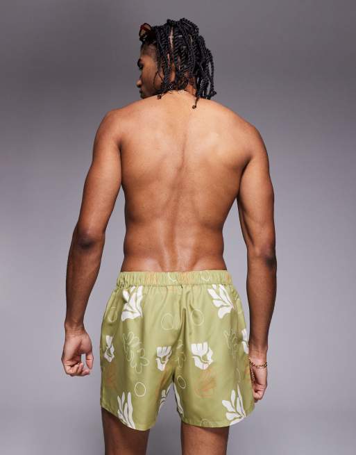 ASOS DESIGN swim shorts in short length with plant print in green, 2 of 4