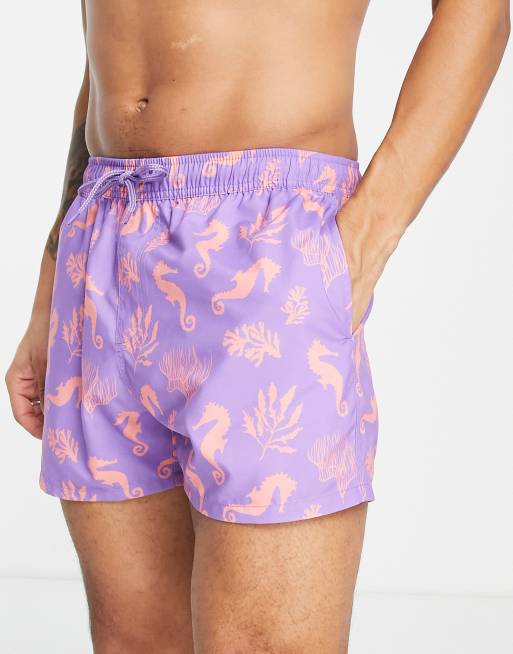 ASOS DESIGN swim shorts in short length with seahorse print in purple (part of a set)