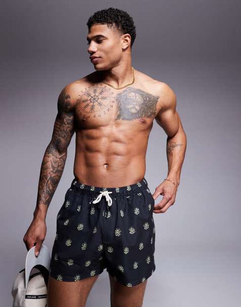ASOS DESIGN swim shorts in short length with seaweed print in black - view 1