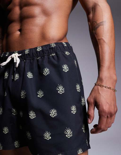 ASOS DESIGN swim shorts in short length with seaweed print in black, 2 of 4