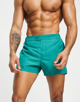 ASOS DESIGN swim shorts in short length with smart styling in green