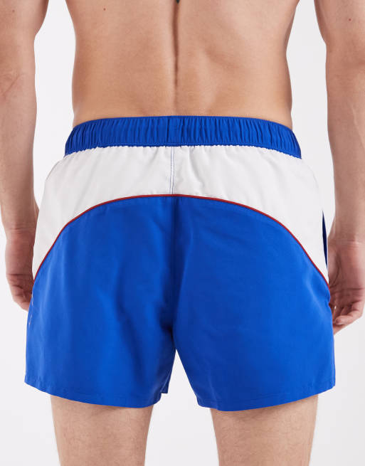 ASOS DESIGN swim shorts in short length with sporty panelling in blue, 6 of 6