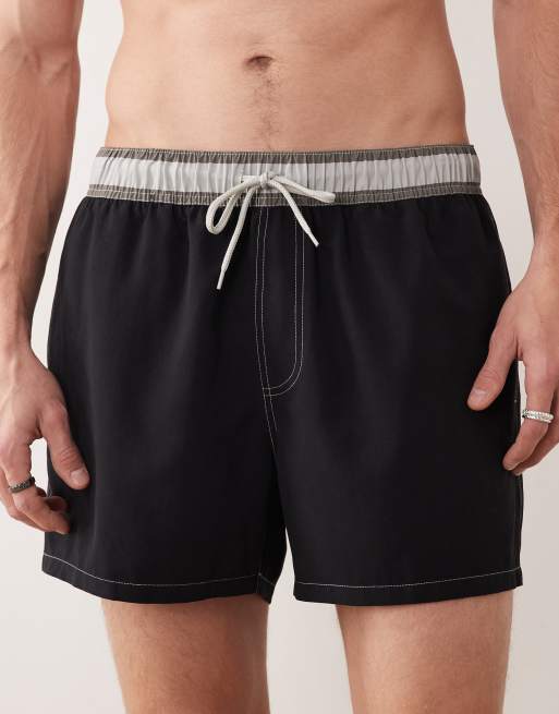 ASOS DESIGN swim shorts in short length with stripe waistband in black, 5 of 5
