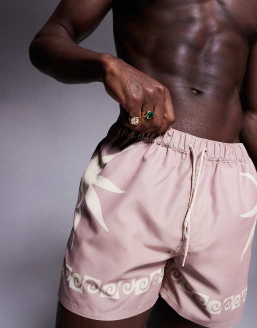 ASOS DESIGN swim shorts in short length with sun print in pink, 4 of 4