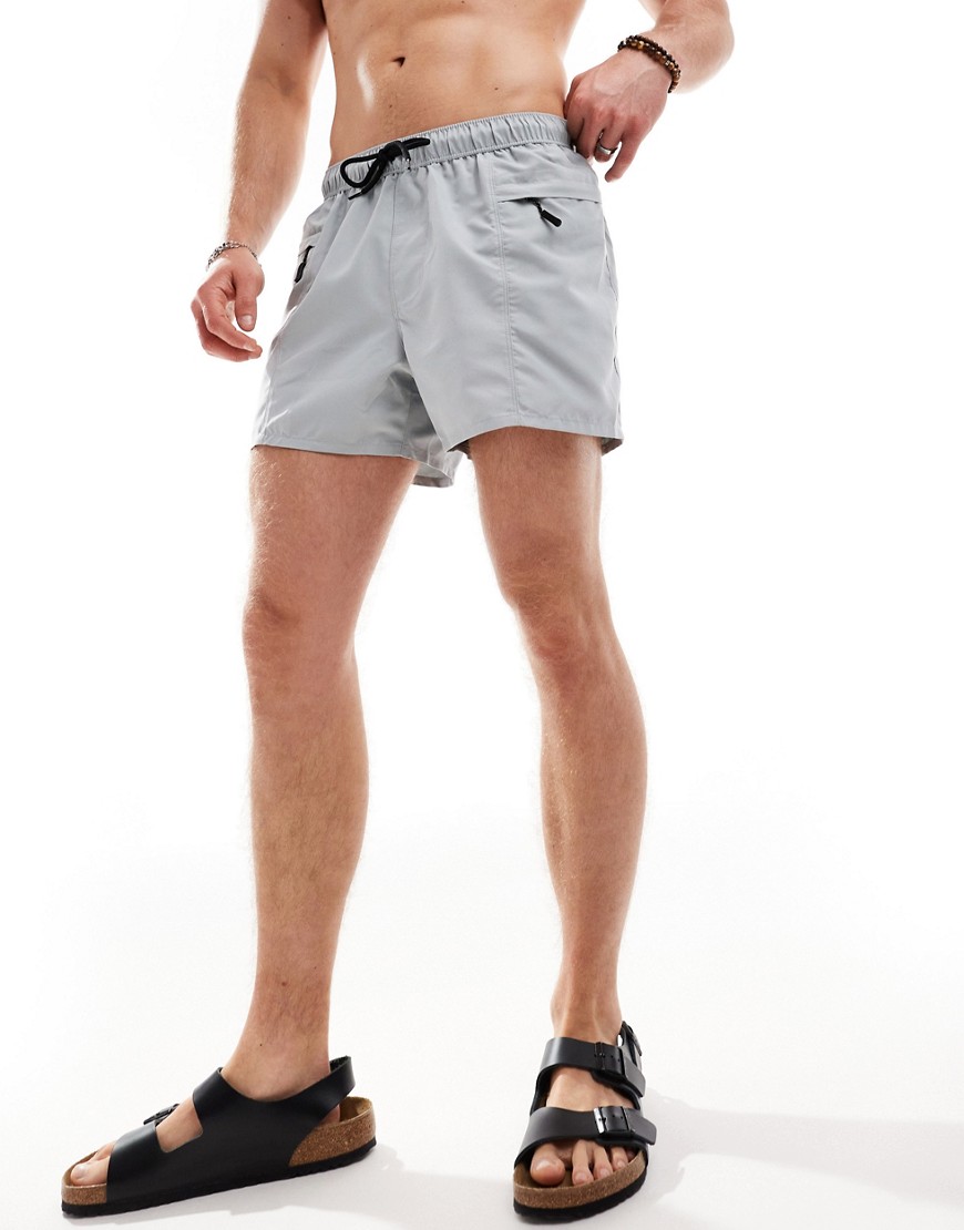 ASOS DESIGN swim shorts in short length with zip pocket and black drawcord in grey