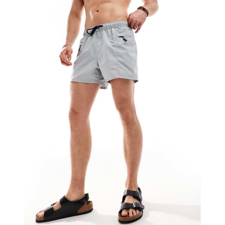 Swim shorts with zips clearance