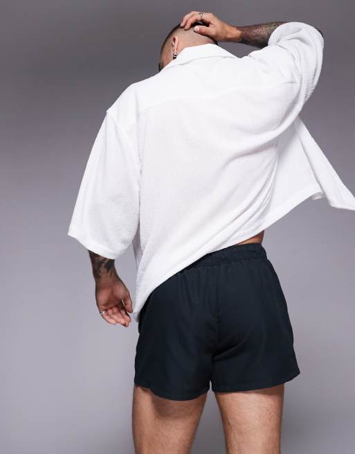 ASOS DESIGN swim shorts in super short length in black and white print, 3 of 4