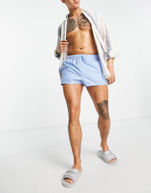 ASOS DESIGN swim shorts in super short length in blue