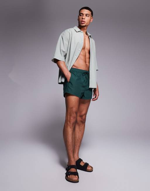 ASOS DESIGN swim shorts in super short length in green