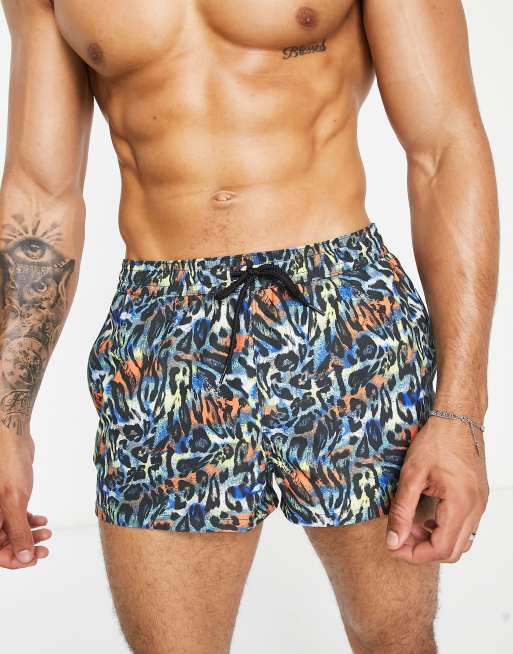 ASOS DESIGN swim briefs in leopard print