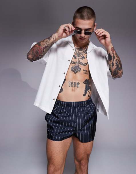 ASOS DESIGN swim shorts in super short length in navy and white pinstripe - view 1