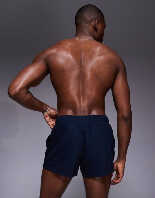 ASOS DESIGN swim shorts in super short length in navy
