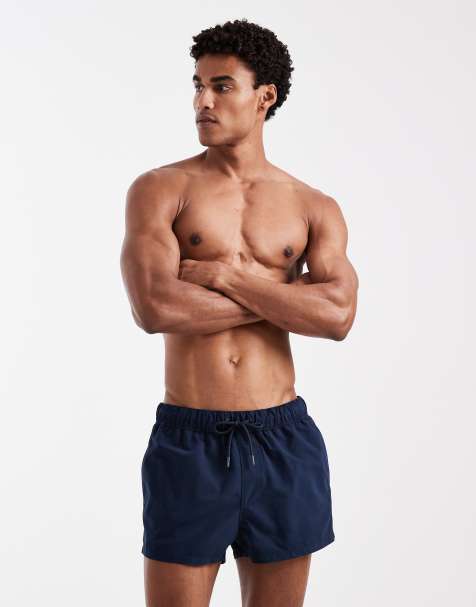 ASOS DESIGN swim shorts in super short length in navy - view 1