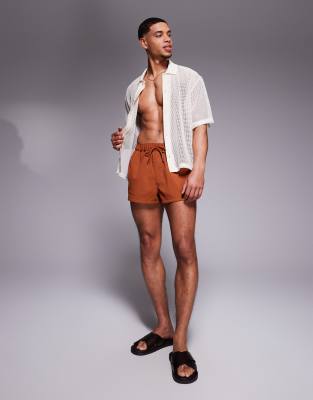 swim shorts in super short length in orange