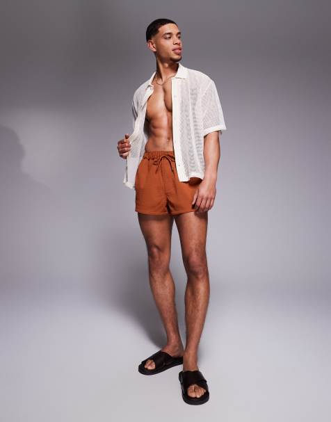 ASOS DESIGN swim shorts in super short length in orange - view 1