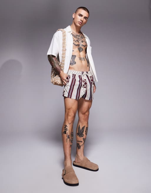 ASOS DESIGN swim shorts in super short length in patchwork print in burgundy, 2 of 4