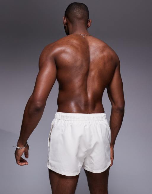 ASOS DESIGN swim shorts in super short length in white