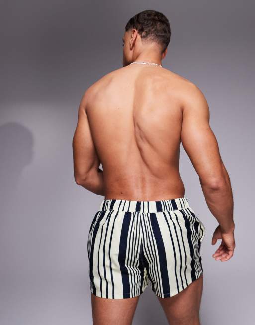 ASOS DESIGN swim shorts in super short length in yellow and navy stripe, 3 of 4