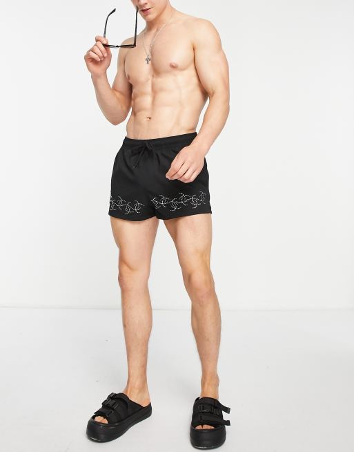 ASOS DESIGN swim shorts in super short length with gem design in black, 4 of 4