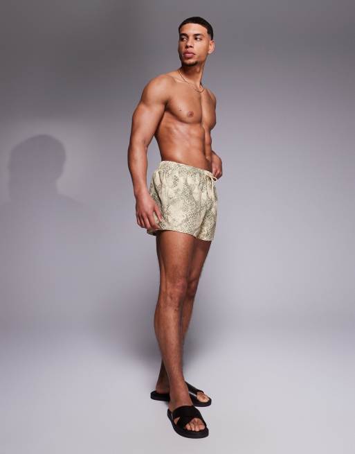 ASOS DESIGN swim shorts in super short length with snake print in stone, 3 of 4