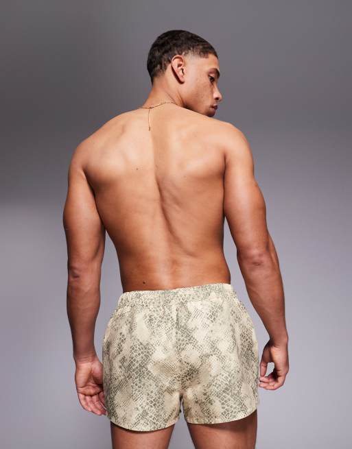 ASOS DESIGN swim shorts in super short length with snake print in stone, 4 of 4