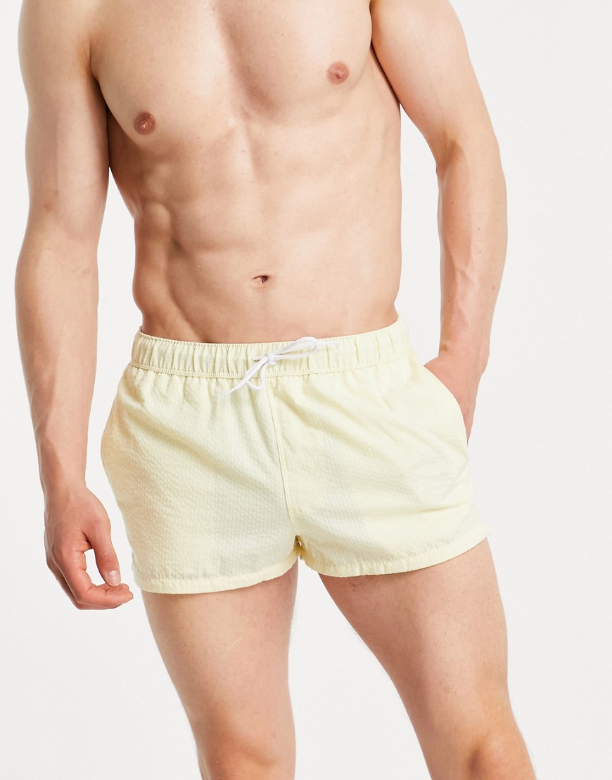 ASOS DESIGN swim shorts in yellow seersucker super short length
