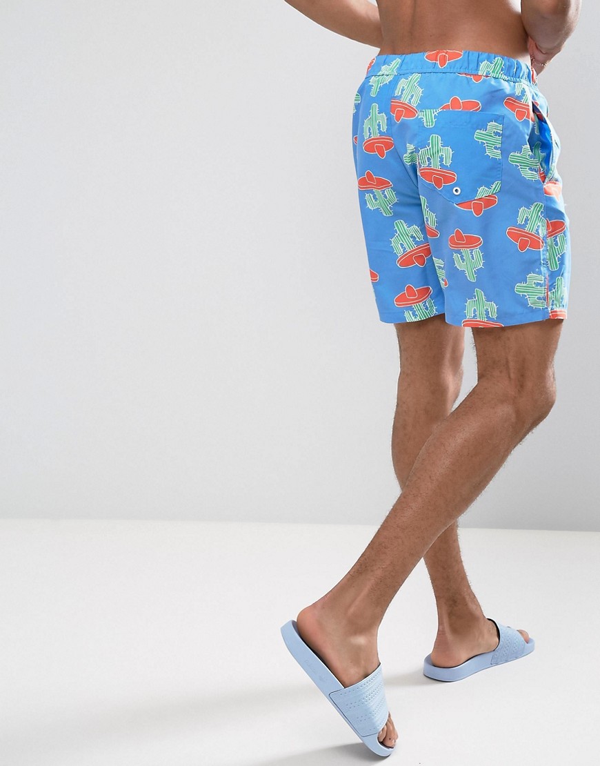 ASOS DESIGN swim shorts with cactus print in mid length-Blue