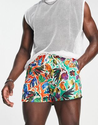 ASOS DESIGN  swim shorts with mixed floral print