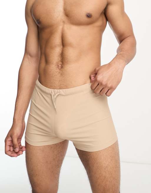 ASOS DESIGN swim trunks in beige