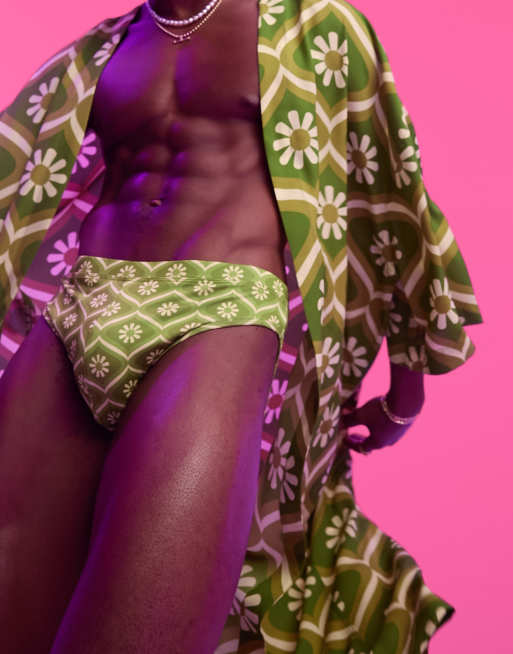 ASOS DESIGN swim trunks in green tile print (part of a set)