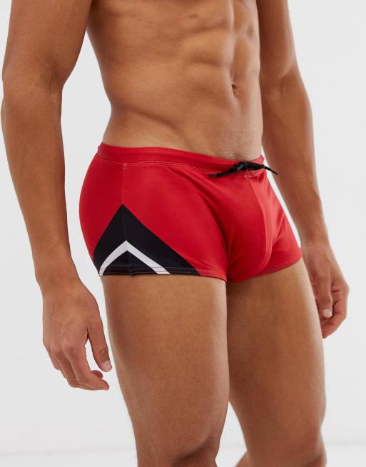 Red and store black swim trunks