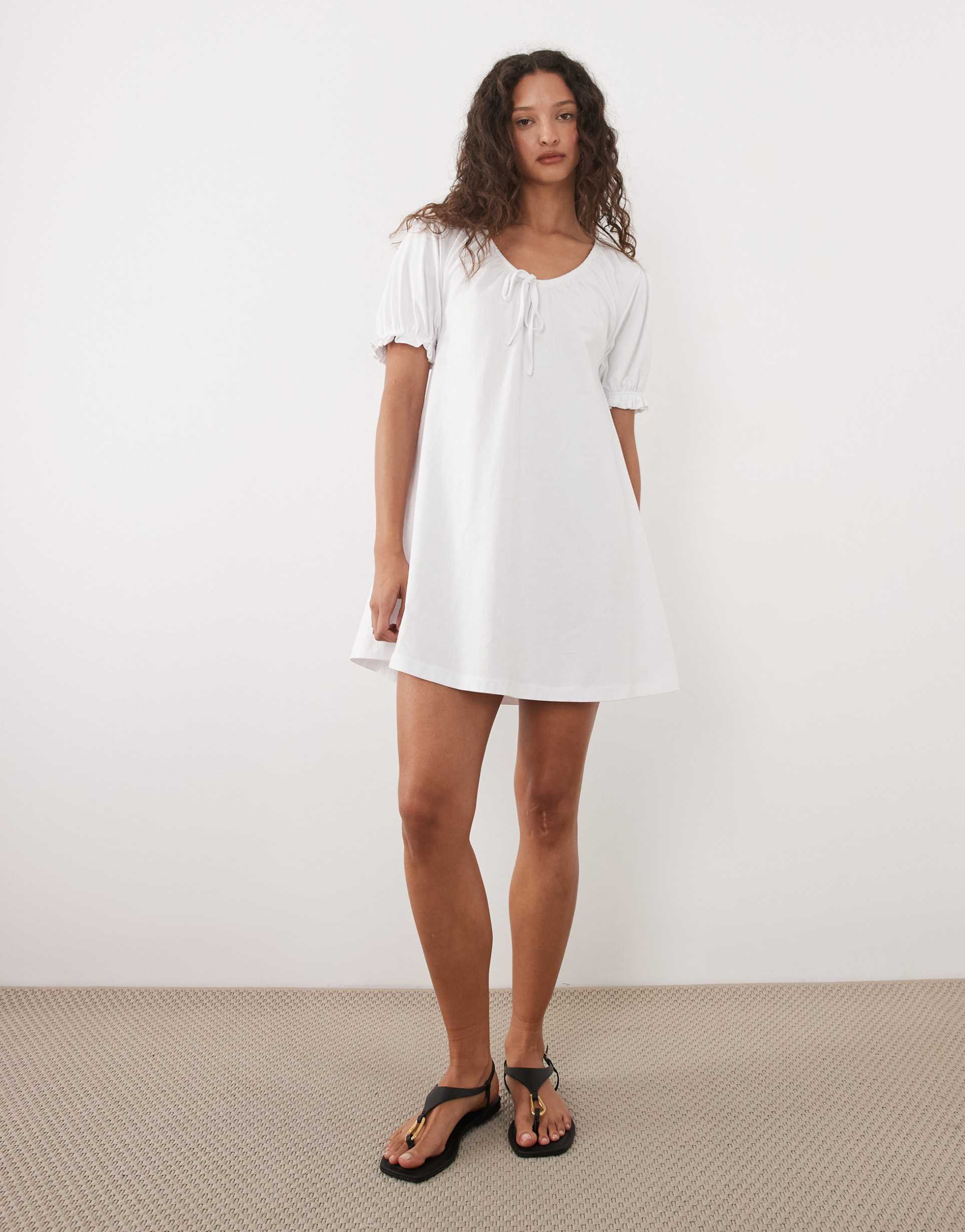 asos design swing baby doll mini dress with puff sleeve in white