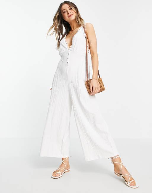ASOS DESIGN - Swingjumpsuit met knopen aan de voorkant en kanten rand in wit