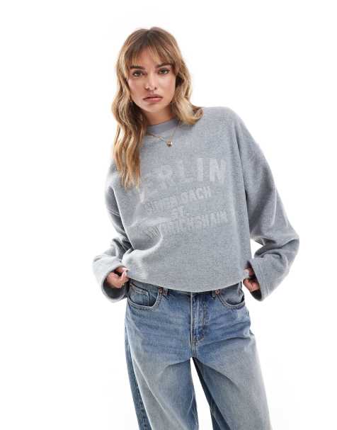 ASOS DESIGN – Szara melanżowa bluza ze sztucznego kożuszka z wytłoczonym napisem „Berlin” - view 1