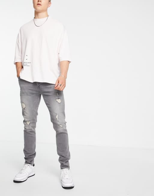 ASOS DESIGN – Szare jeansy o obcisłym kroju z przetarciami