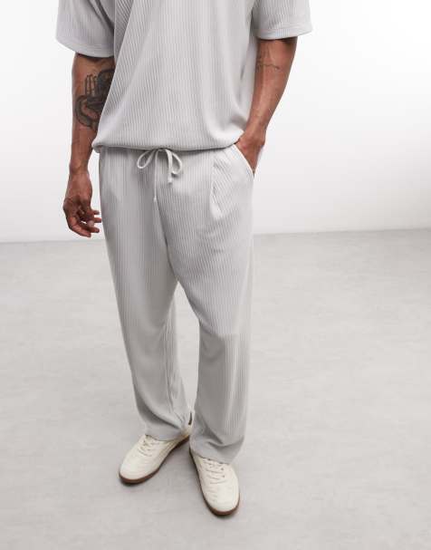 ASOS DESIGN – Szare plisowane joggersy o luźnym kroju ze zwężanymi nogawkami - view 1