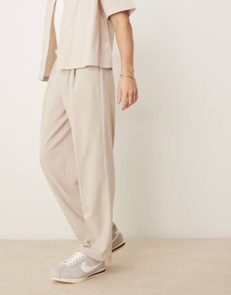 ASOS DESIGN – Szarobeżowe eleganckie spodnie z szerokimi nogawkami z fakturowanego materiału - view 1