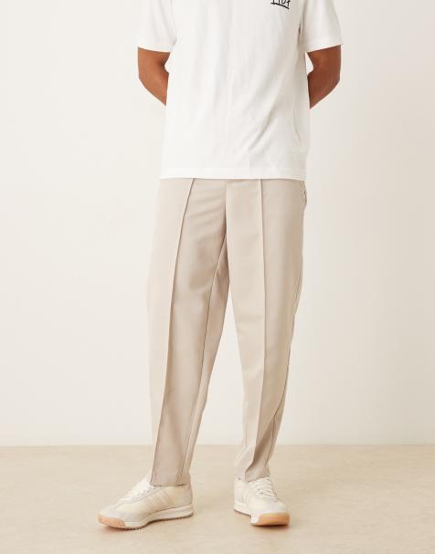 ASOS DESIGN straight leg trouser with elasticated waist band and pintucks in stone