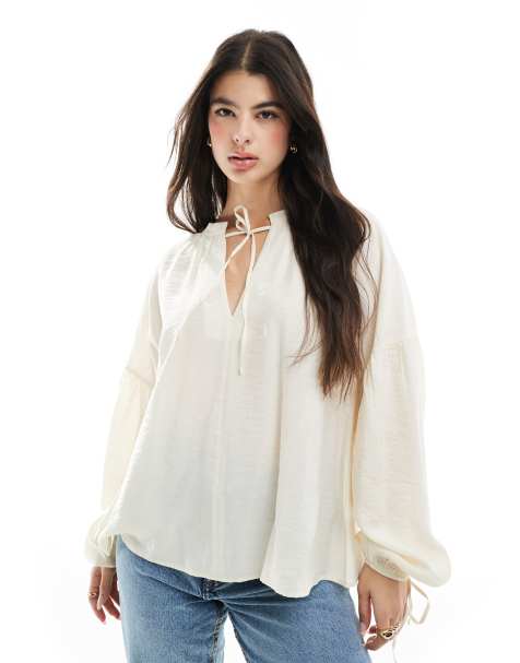 ASOS DESIGN tie neck top  with volume sleeve in stone
