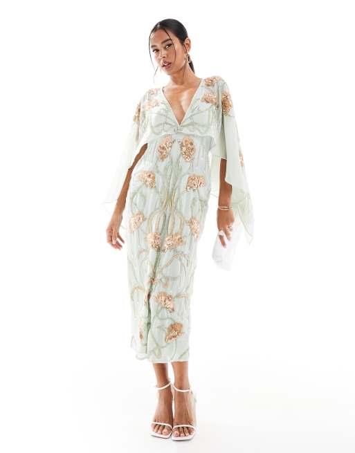 ASOS DESIGN – Szałwiowozielona sukienka midi ze zdobieniem w kwiatowy wzór i pelerynką