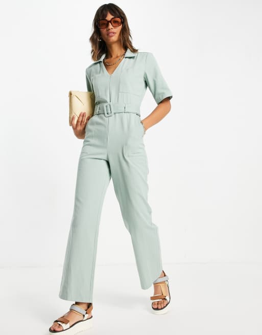 ASOS DESIGN – Szałwiowy kombinezon z diagonalu z suwakiem z przodu, klamrą i nogawkami typu dzwony