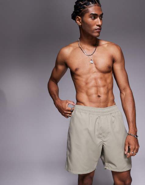 ASOS DESIGN swim shorts in mid length in khaki