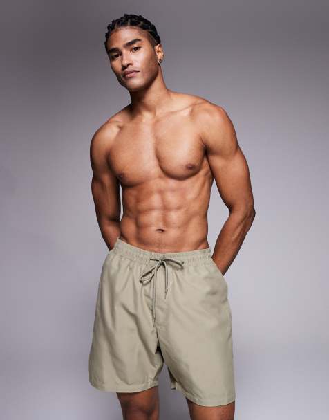 ASOS DESIGN swim shorts in mid length in khaki
