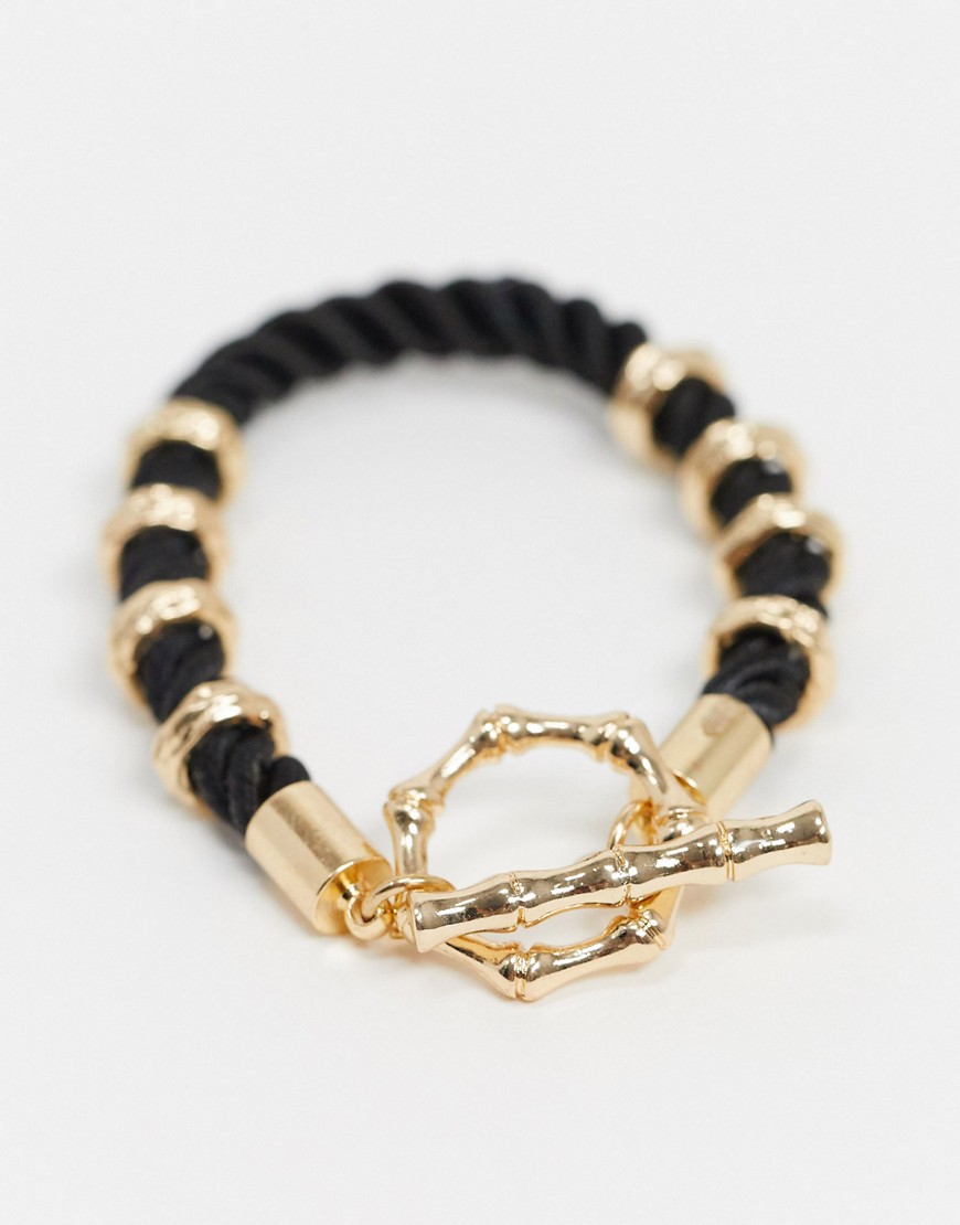 ASOS DESIGN - T-bar armbånd med reb og bambusdesign i sort og guld
