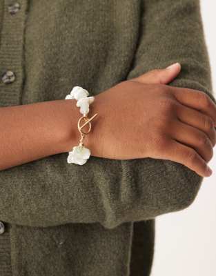 ASOS DESIGN t-bar bracelet with faux chipping details in gold tone