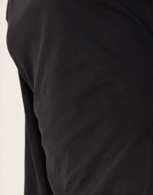 ASOS DESIGN - T-shirt a maniche lunghe nera con fondo asimmetrico e vita alta, 3 di 4